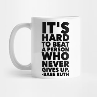 It's Hard To Beat A Person Who Never Gives Up Mug